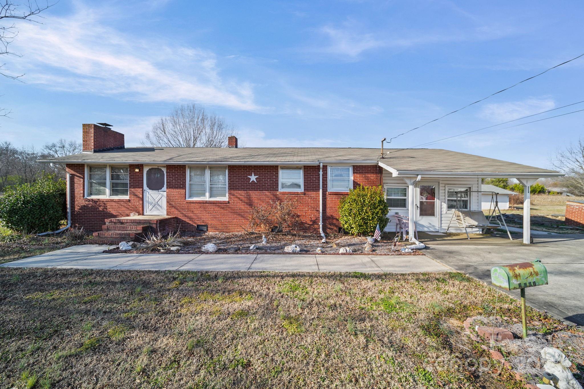 2601-2617 Olive Branch Road Monroe, NC 28110 - Photo 11 of 30 a view of a house with garden
