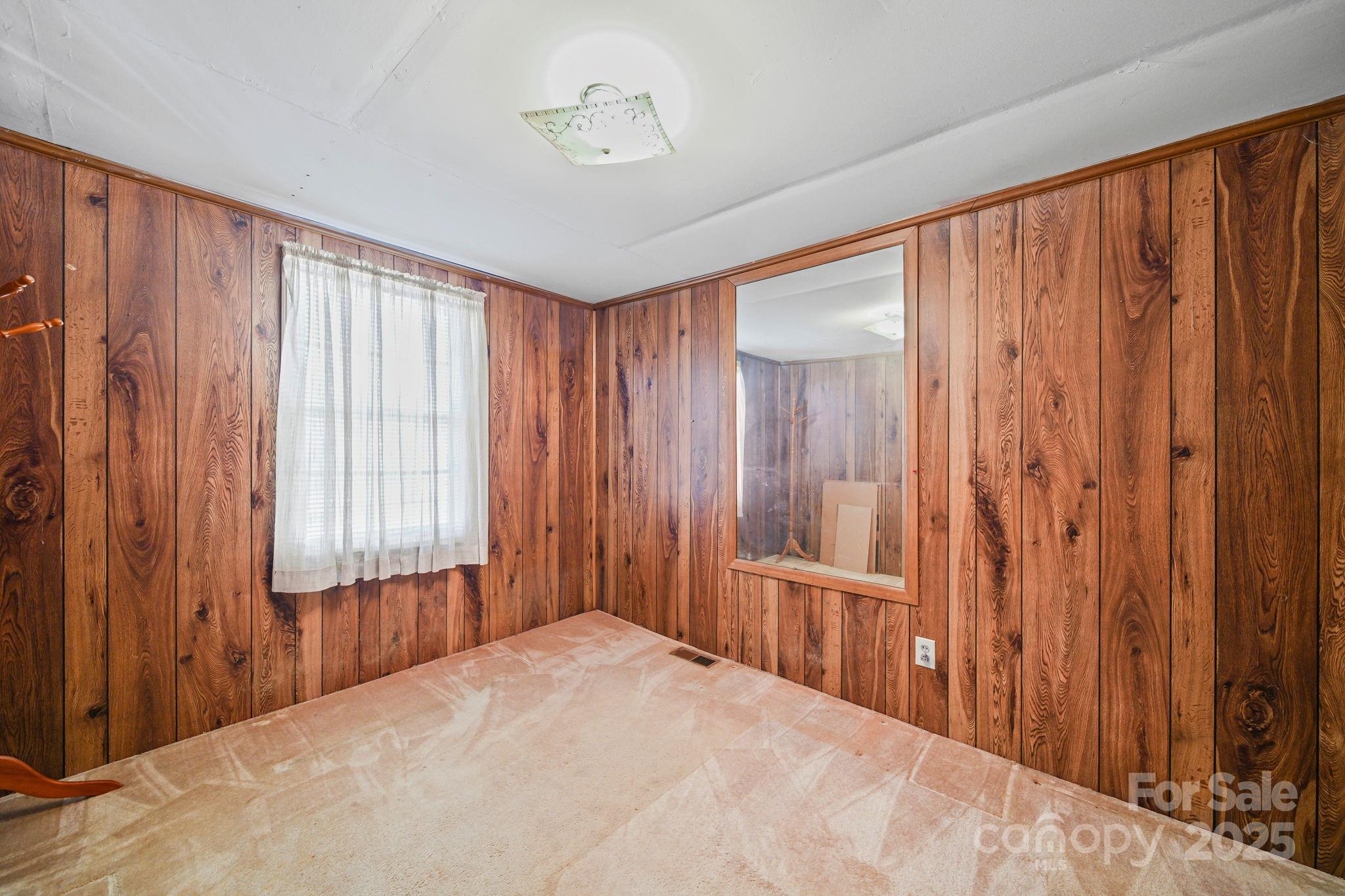 2601-2617 Olive Branch Road Monroe, NC 28110 - Photo 19 of 30 a view of a room with a balcony and a window