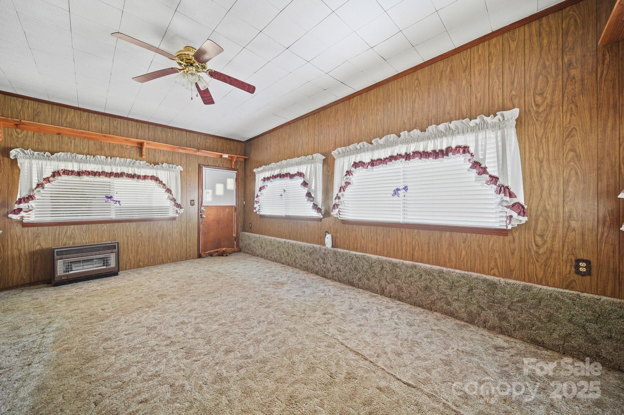 2601-2617 Olive Branch Road Monroe, NC 28110 - Photo 24 of 30 a view of a hallway with a ceiling fan