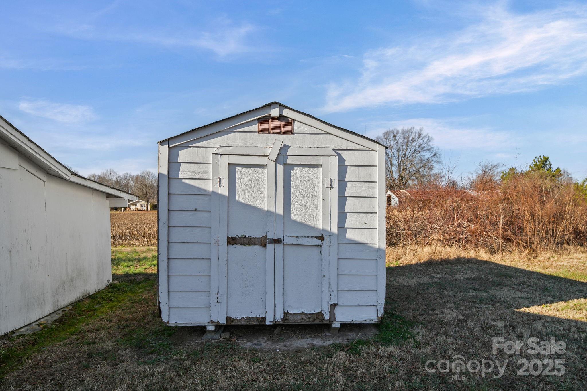 2601-2617 Olive Branch Road Monroe, NC 28110 - Photo 27 of 30 a front view of a house with a yard