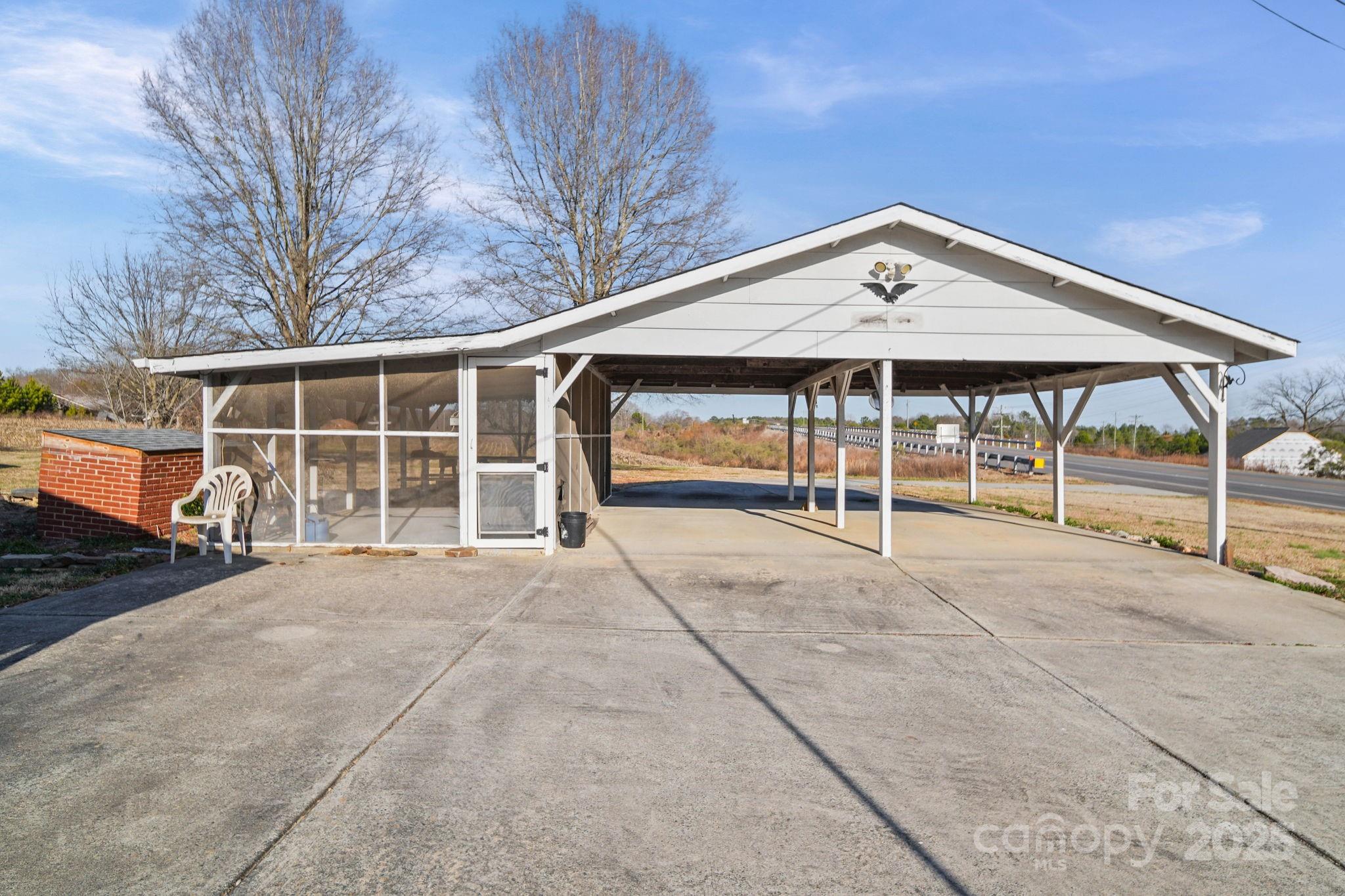 2601-2617 Olive Branch Road Monroe, NC 28110 - Photo 5 of 30 a view of house with outdoor space and balcony