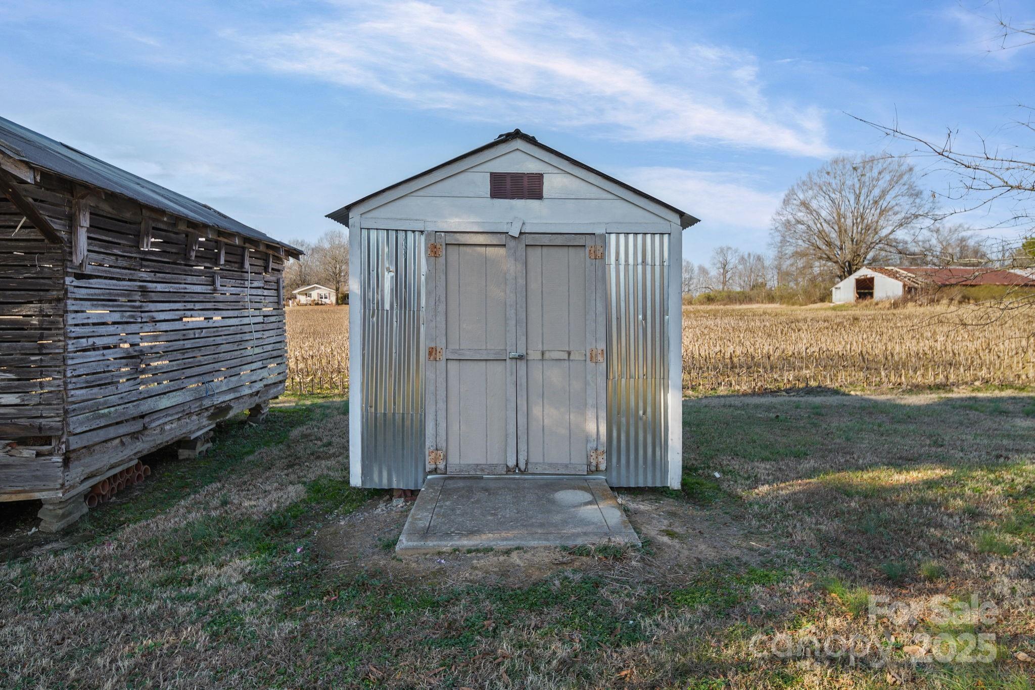 2601-2617 Olive Branch Road Monroe, NC 28110 - Photo 10 of 30 a front view of a house with a yard