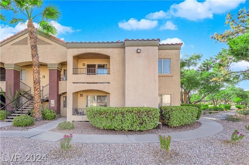 7885 West Flamingo Road, Unit 2004 Las Vegas, NV 89147 - Photo 20 of 23 This desert oasis features multi-level residences, outdoor living spaces, and beautiful desert landscaping.