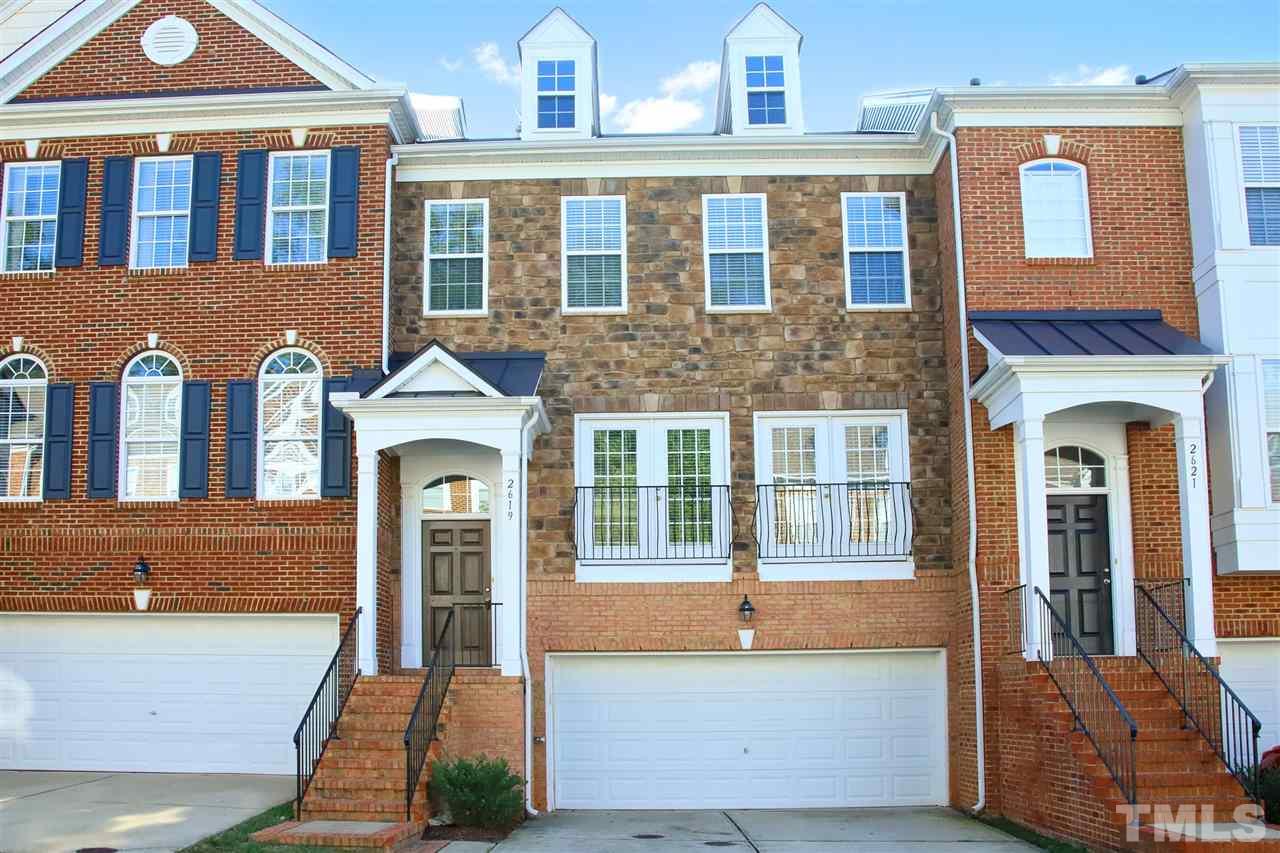 2619 Laurel Cherry Street Raleigh, NC 27612 - Photo 1 of 30 a front view of a house with a yard