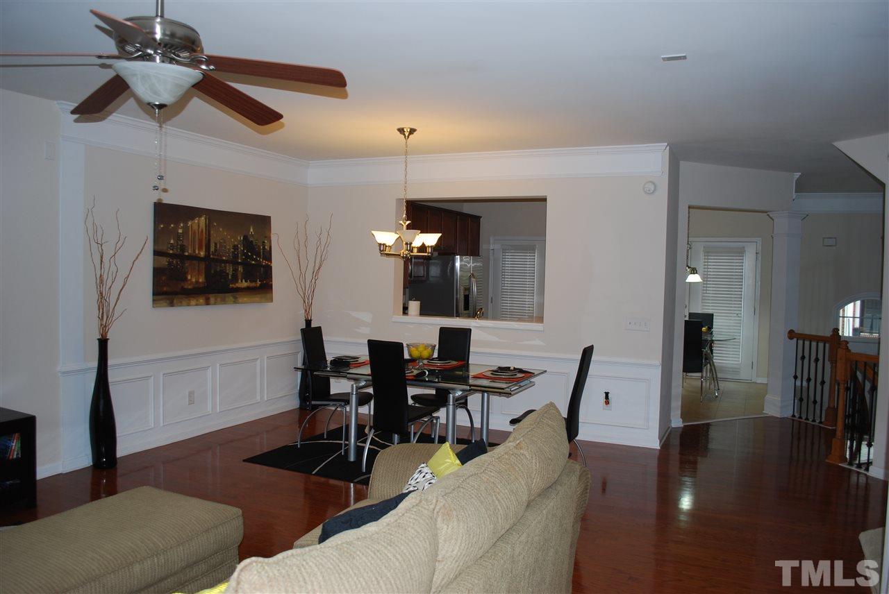 2619 Laurel Cherry Street Raleigh, NC 27612 - Photo 13 of 30 a view of a livingroom with furniture and a flat screen tv