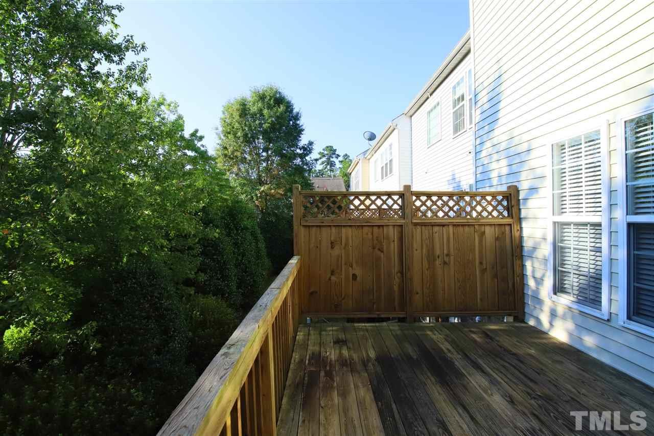 2619 Laurel Cherry Street Raleigh, NC 27612 - Photo 16 of 30 a view of balcony with wooden floor and fence