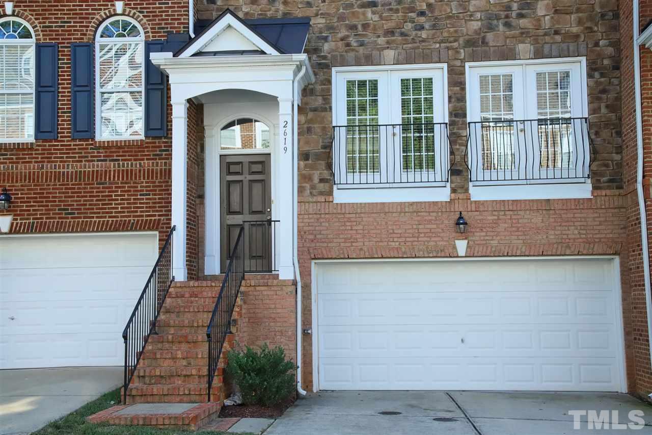 2619 Laurel Cherry Street Raleigh, NC 27612 - Photo 2 of 30 a view of a brick house with large windows