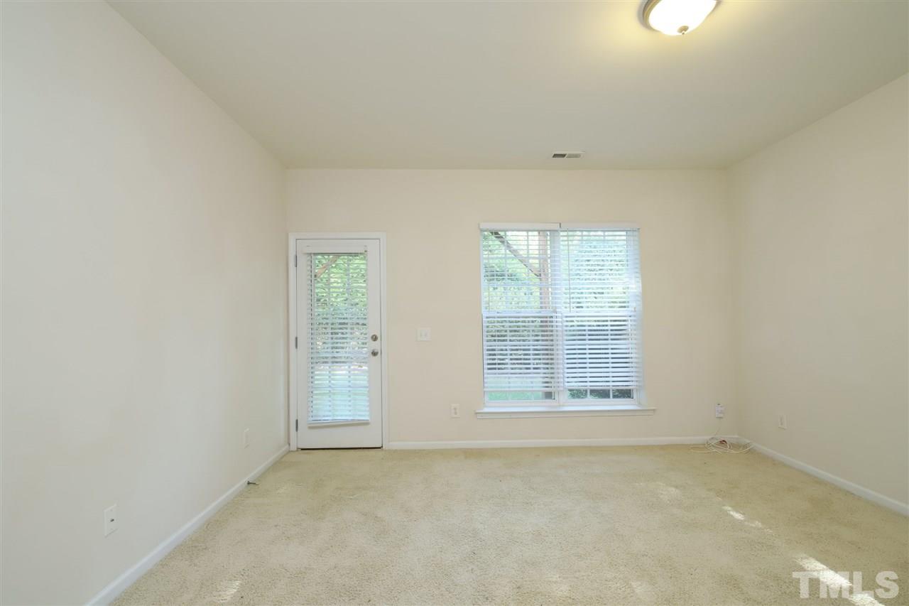 2619 Laurel Cherry Street Raleigh, NC 27612 - Photo 27 of 30 an empty room with windows