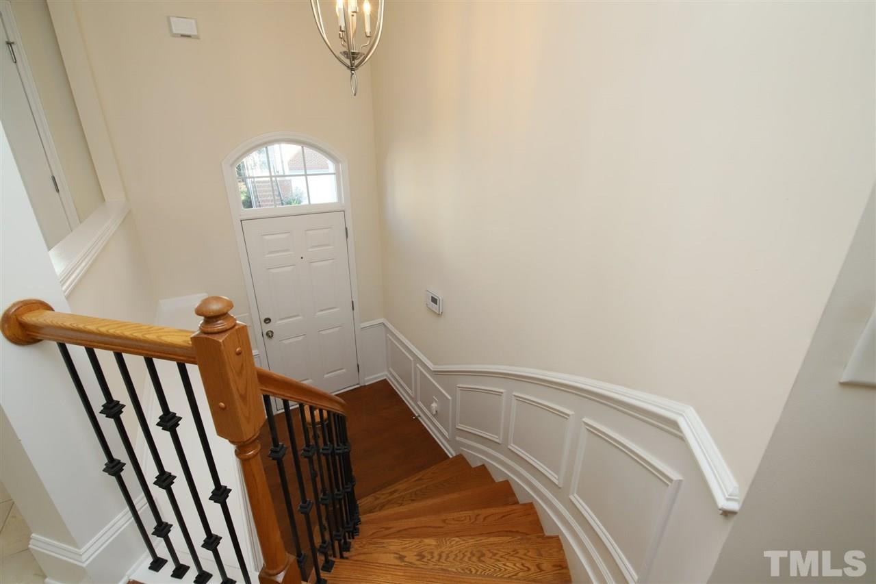 2619 Laurel Cherry Street Raleigh, NC 27612 - Photo 3 of 30 a view of staircase with railing and white walls