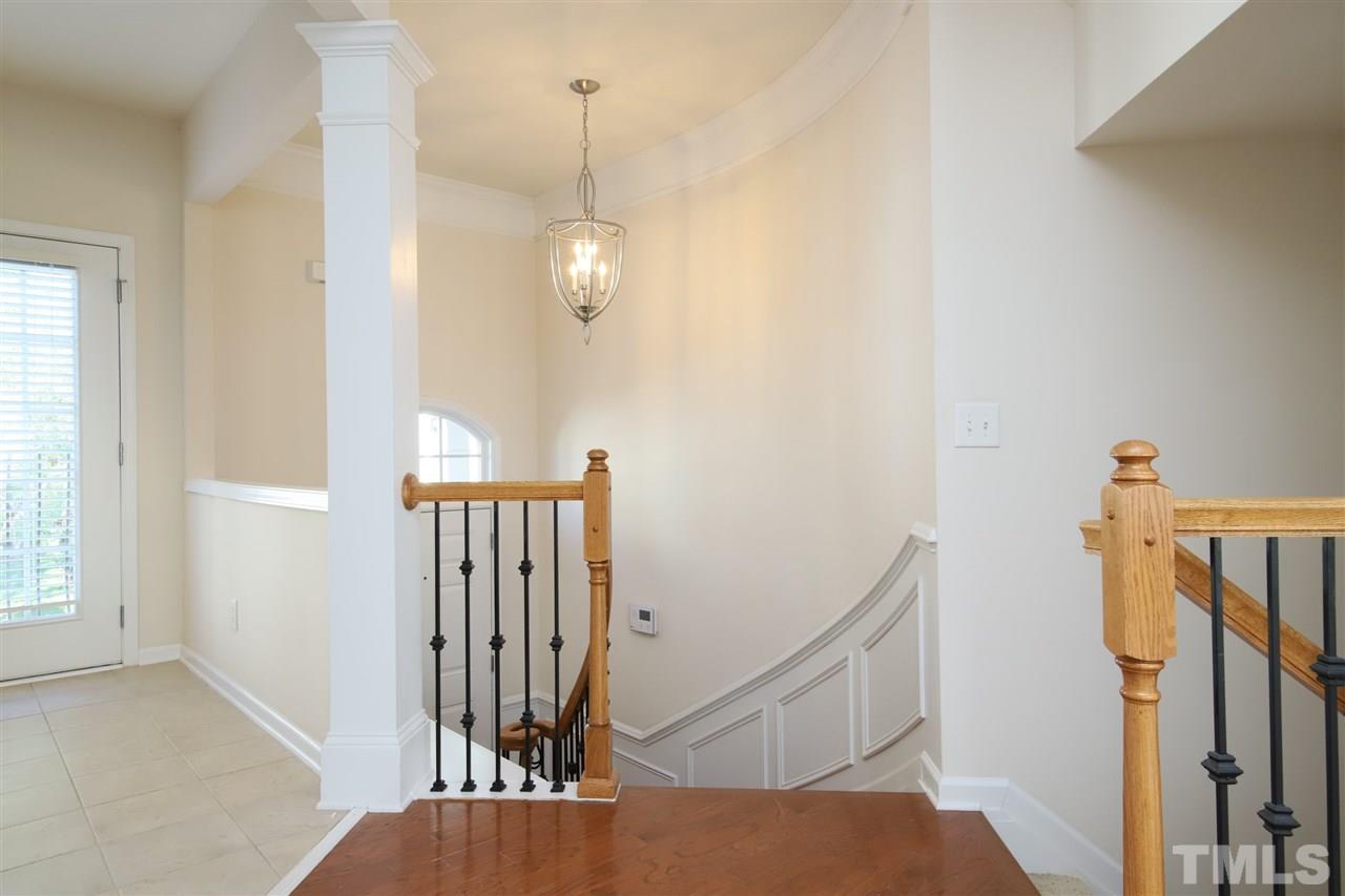 2619 Laurel Cherry Street Raleigh, NC 27612 - Photo 4 of 30 a view of a hallway with windows
