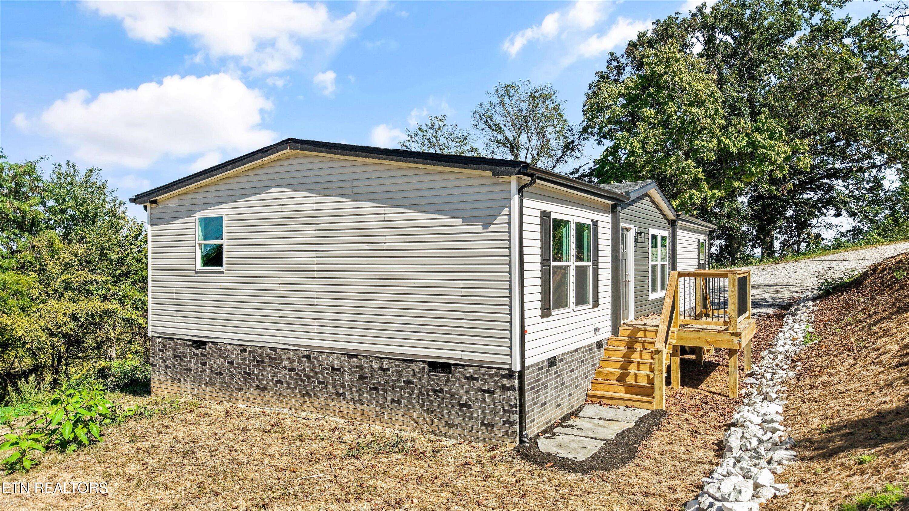 3827 Demory Road La Follette, TN 37766 - Photo 2 of 28 Side Elevation