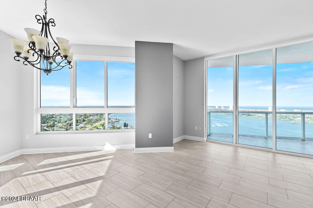 241 Riverside Drive, Unit 2610 Daytona Beach, FL 32117 - Photo 4 of 31 a view of an empty room with a window