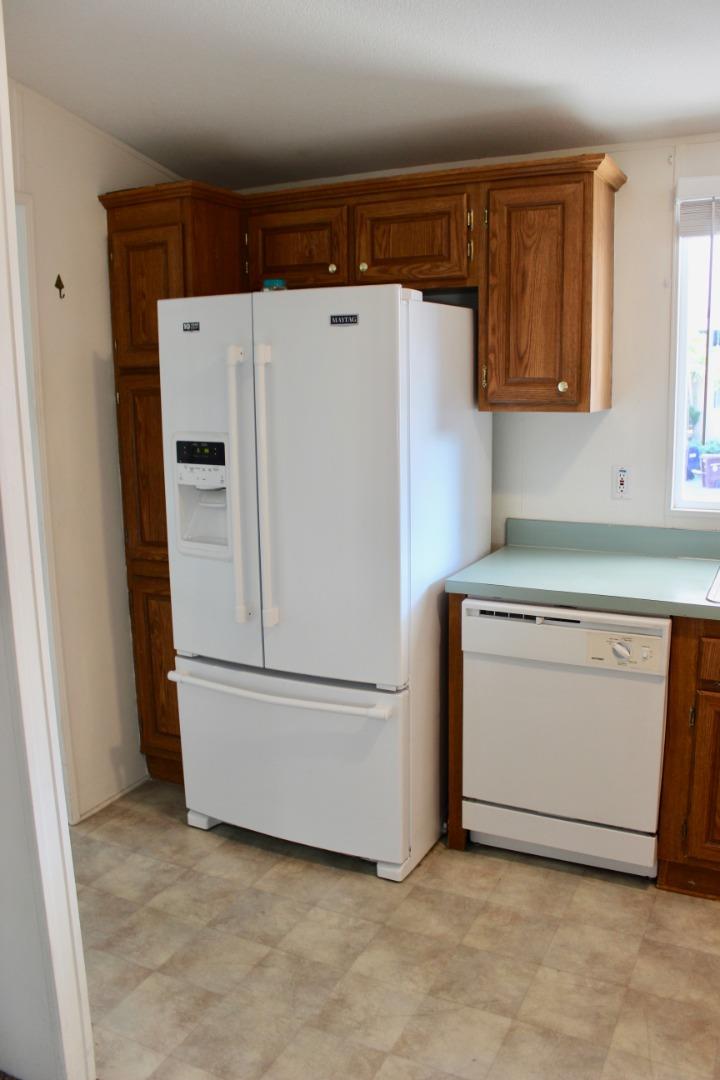 930 Rosedale Avenue, Unit 35 Capitola, CA 95010 - Photo 5 of 18 a utility room with dryer and washer