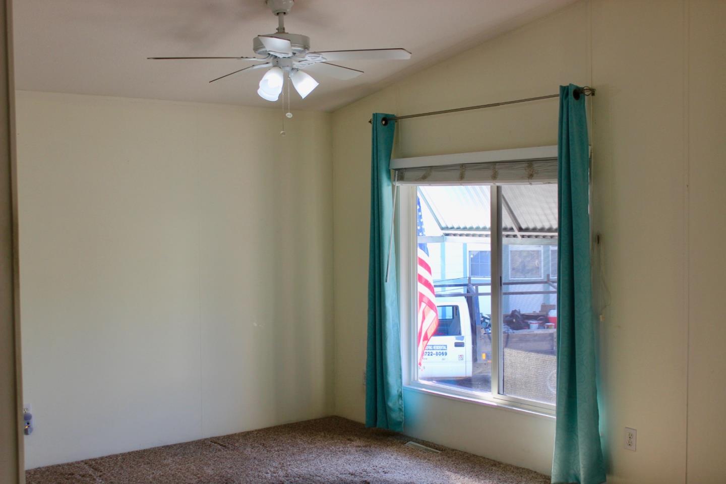 930 Rosedale Avenue, Unit 35 Capitola, CA 95010 - Photo 6 of 18 a view of an empty room with a window