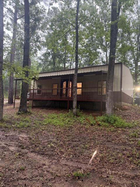 a view of a backyard with a small cabin