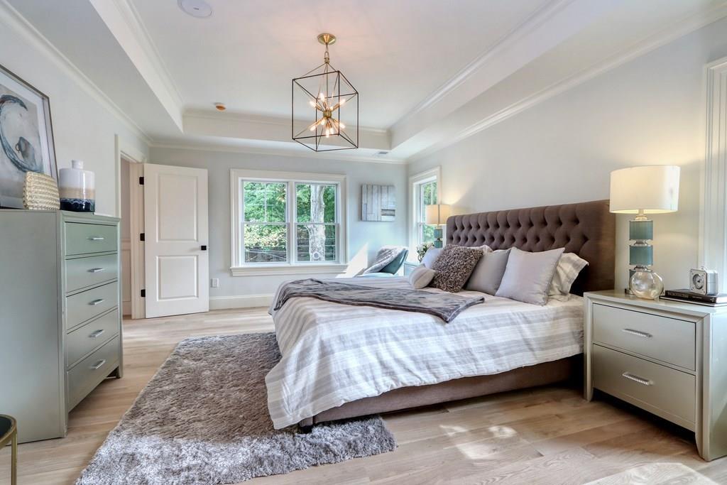 135 Waban Hill Road North Newton, MA 02467 - Photo 16 of 36 a bedroom with a large bed and a window