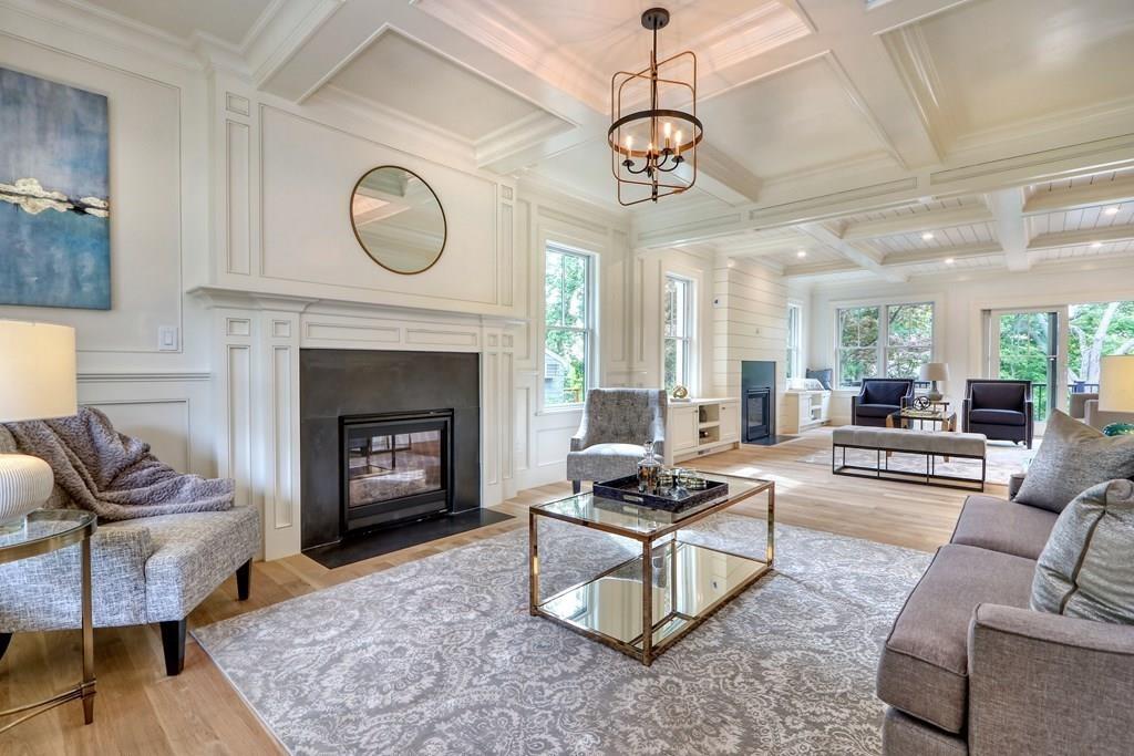 135 Waban Hill Road North Newton, MA 02467 - Photo 2 of 36 a living room with furniture a fireplace and a table