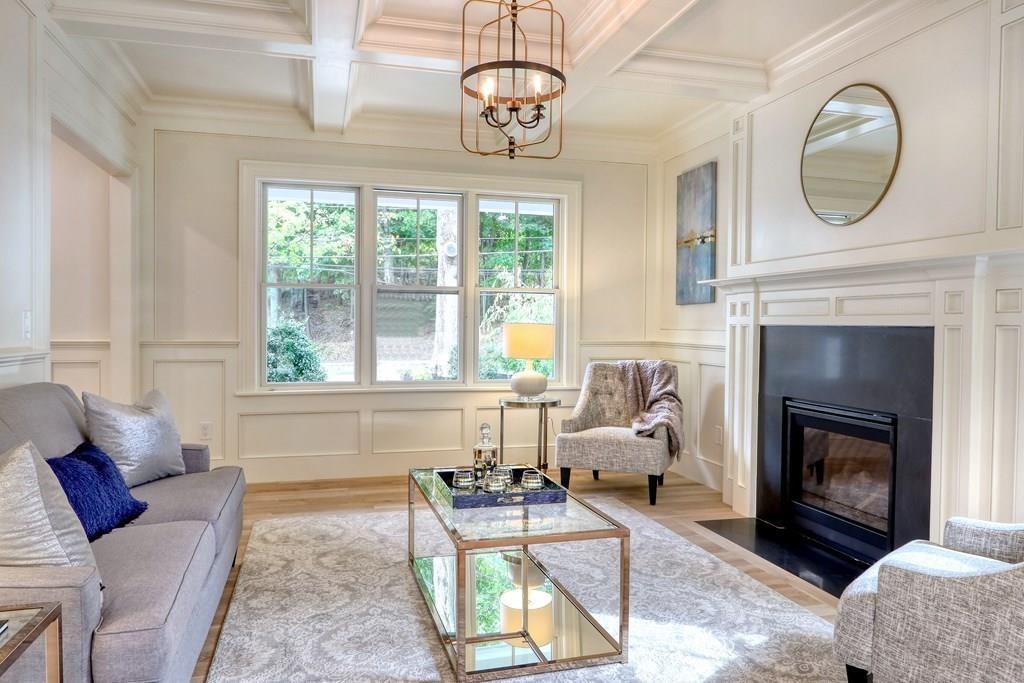 135 Waban Hill Road North Newton, MA 02467 - Photo 3 of 36 a living room with furniture a fireplace and a large window