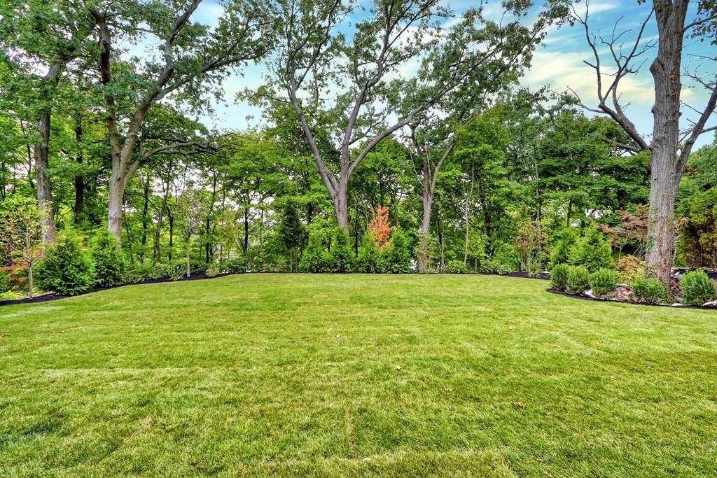 135 Waban Hill Road North Newton, MA 02467 - Photo 34 of 36 a view of a field with trees in the background
