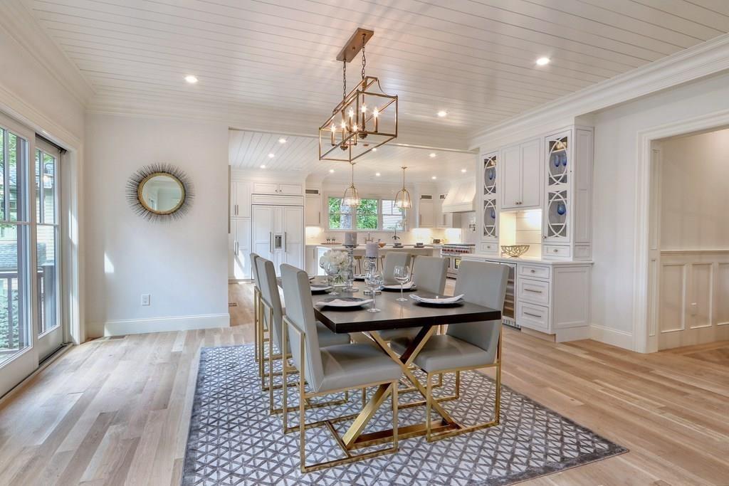 135 Waban Hill Road North Newton, MA 02467 - Photo 7 of 36 a view of a dining room with furniture and wooden floor