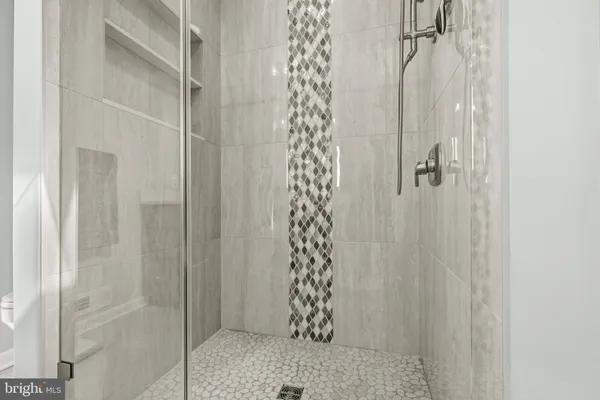 a room with furniture pool table and a rug