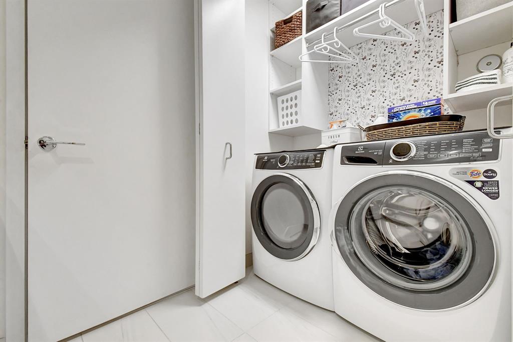 1116 North Ocean Boulevard, Unit 303 Pompano Beach, FL 33062 - Photo 28 of 52 a utility room with dryer and washer