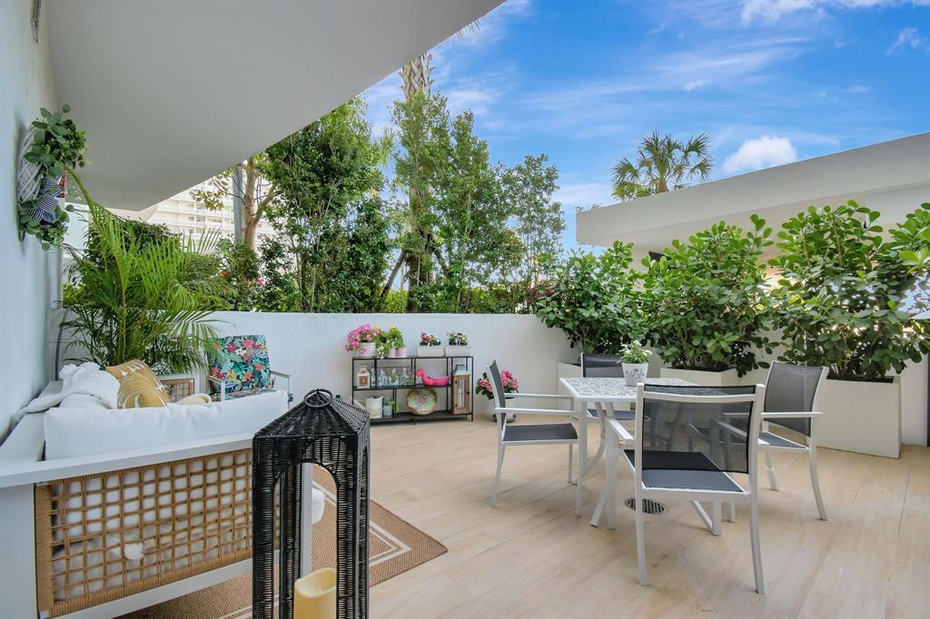 1116 North Ocean Boulevard, Unit 303 Pompano Beach, FL 33062 - Photo 33 of 52 a outdoor view with a sitting space