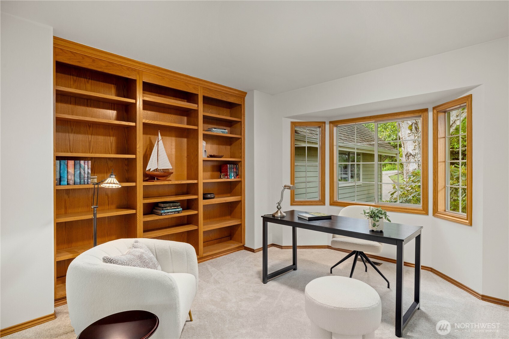 8484 Northeast County Park Road Bainbridge Island, WA 98110 - Photo 11 of 35 a living room with furniture and a window