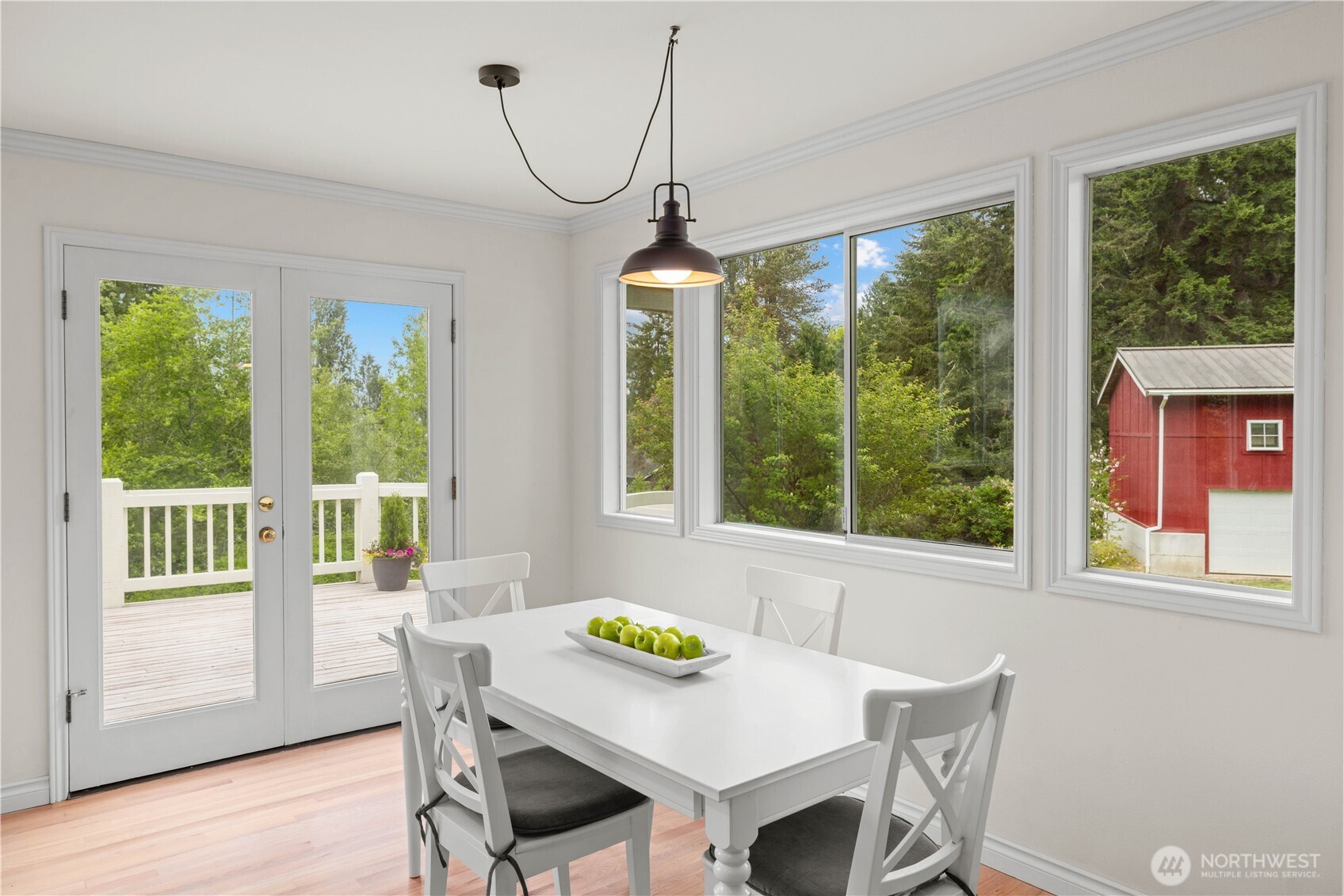 8484 Northeast County Park Road Bainbridge Island, WA 98110 - Photo 15 of 35 a view of a dining room with furniture window and outside view