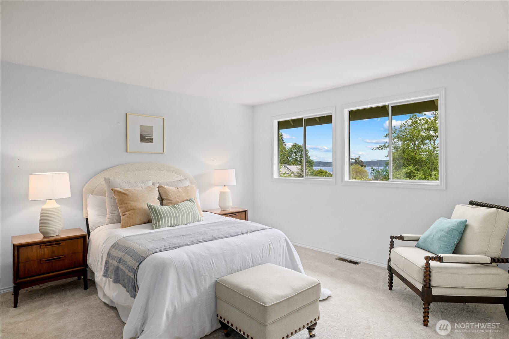 8484 Northeast County Park Road Bainbridge Island, WA 98110 - Photo 23 of 35 a bedroom with a bed and a couch