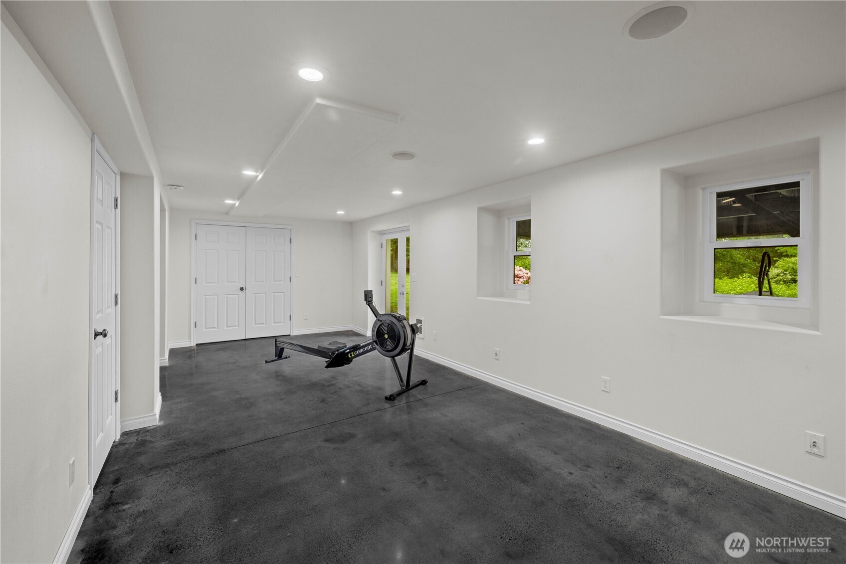 8484 Northeast County Park Road Bainbridge Island, WA 98110 - Photo 29 of 35 a view of a hallway with a room