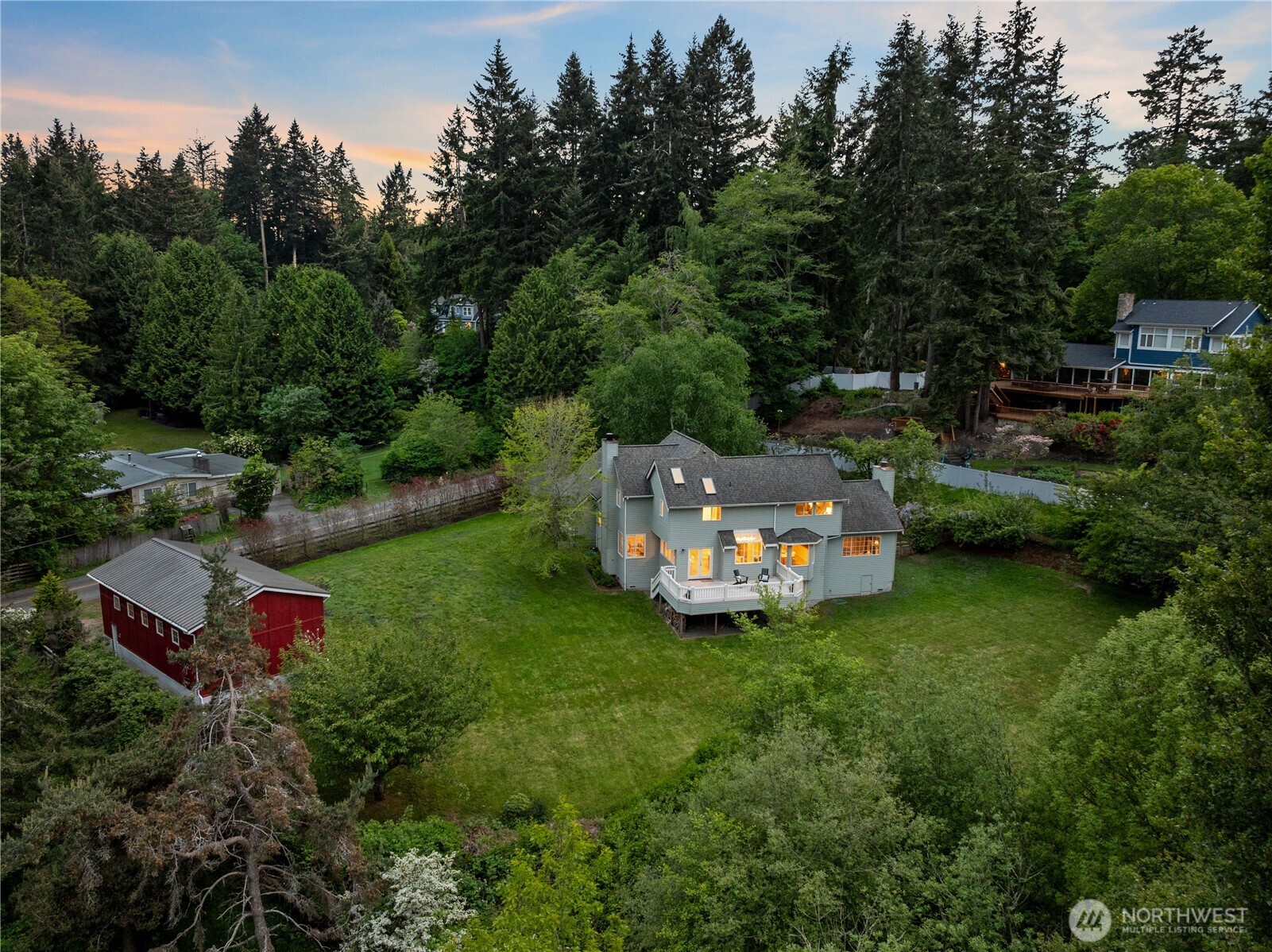 8484 Northeast County Park Road Bainbridge Island, WA 98110 - Photo 3 of 35 an aerial view of a house with a yard