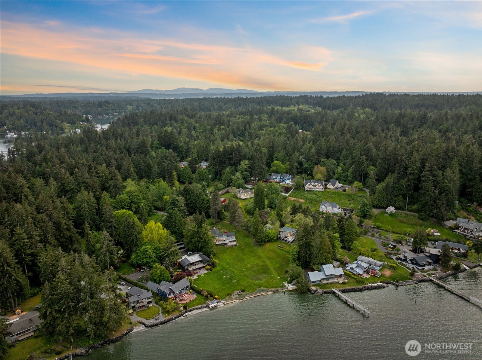 8484 Northeast County Park Road Bainbridge Island, WA 98110 - Photo 34 of 35 a view of a city with lush green forest