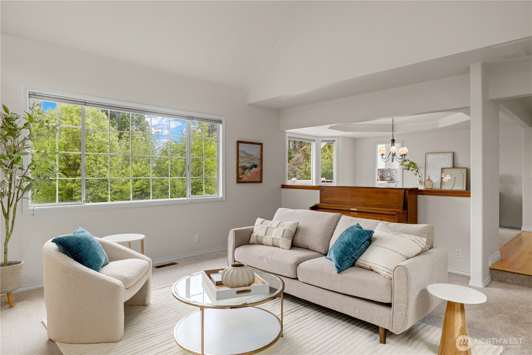 8484 Northeast County Park Road Bainbridge Island, WA 98110 - Photo 7 of 35 a living room with furniture and a large window