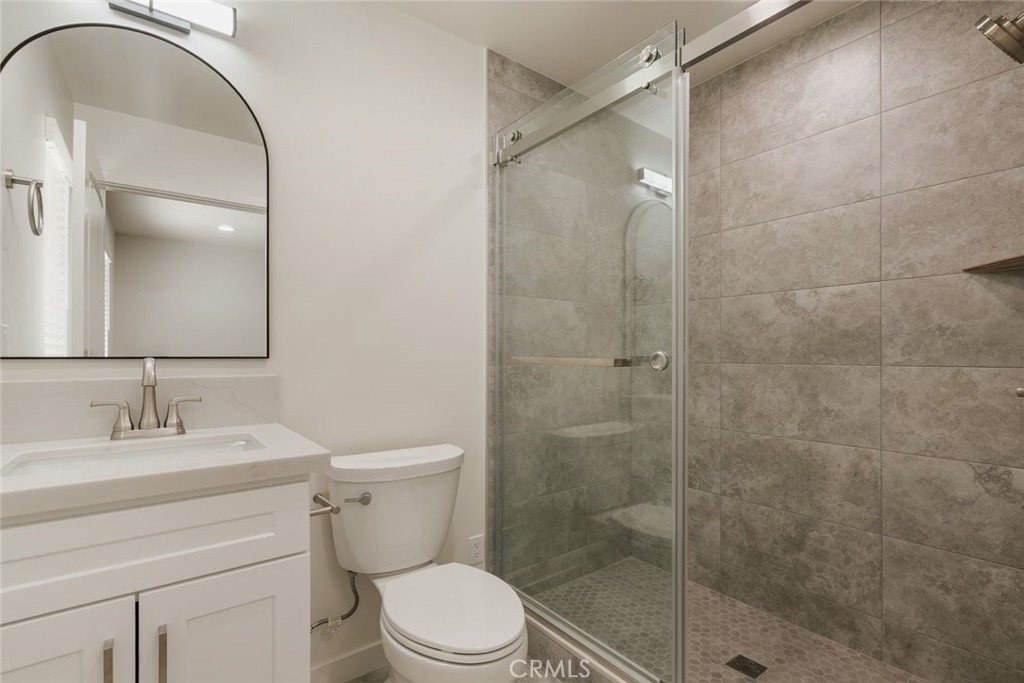 1806 South 8th Street, Unit B Alhambra, CA 91803 - Photo 31 of 44 a bathroom with a sink a toilet and shower