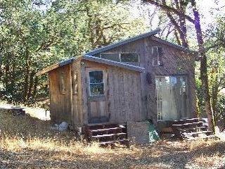 3500 Dos Rios Road Laytonville, CA 95454 - Photo 6 of 7 a backyard of a house with lots of green space
