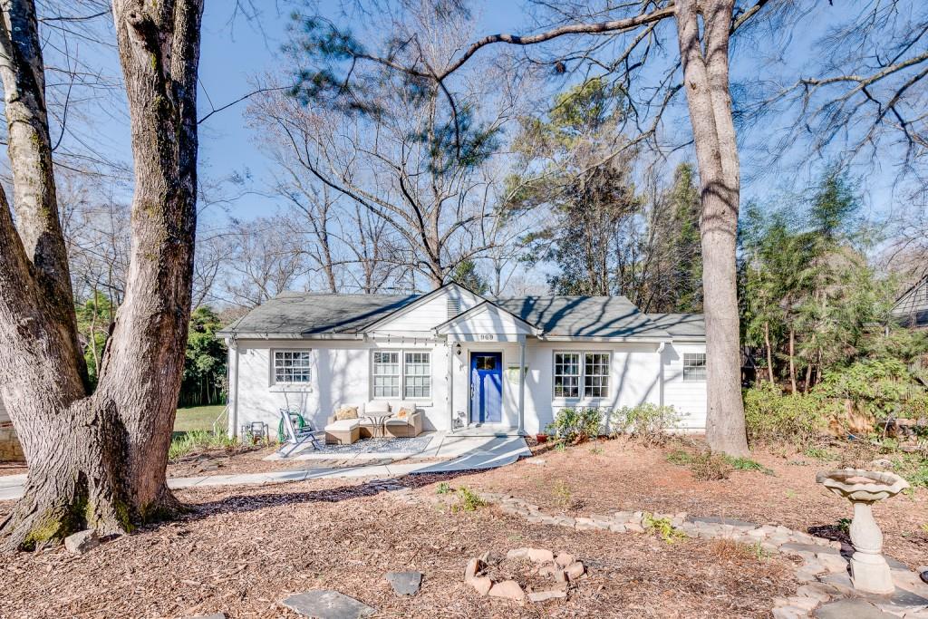 969 North Carter Road Decatur, GA 30030 - Photo 1 of 1 a view of a large house with a tree in the yard