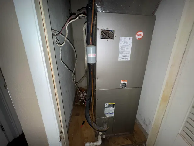 a bathroom with a shower and a sink