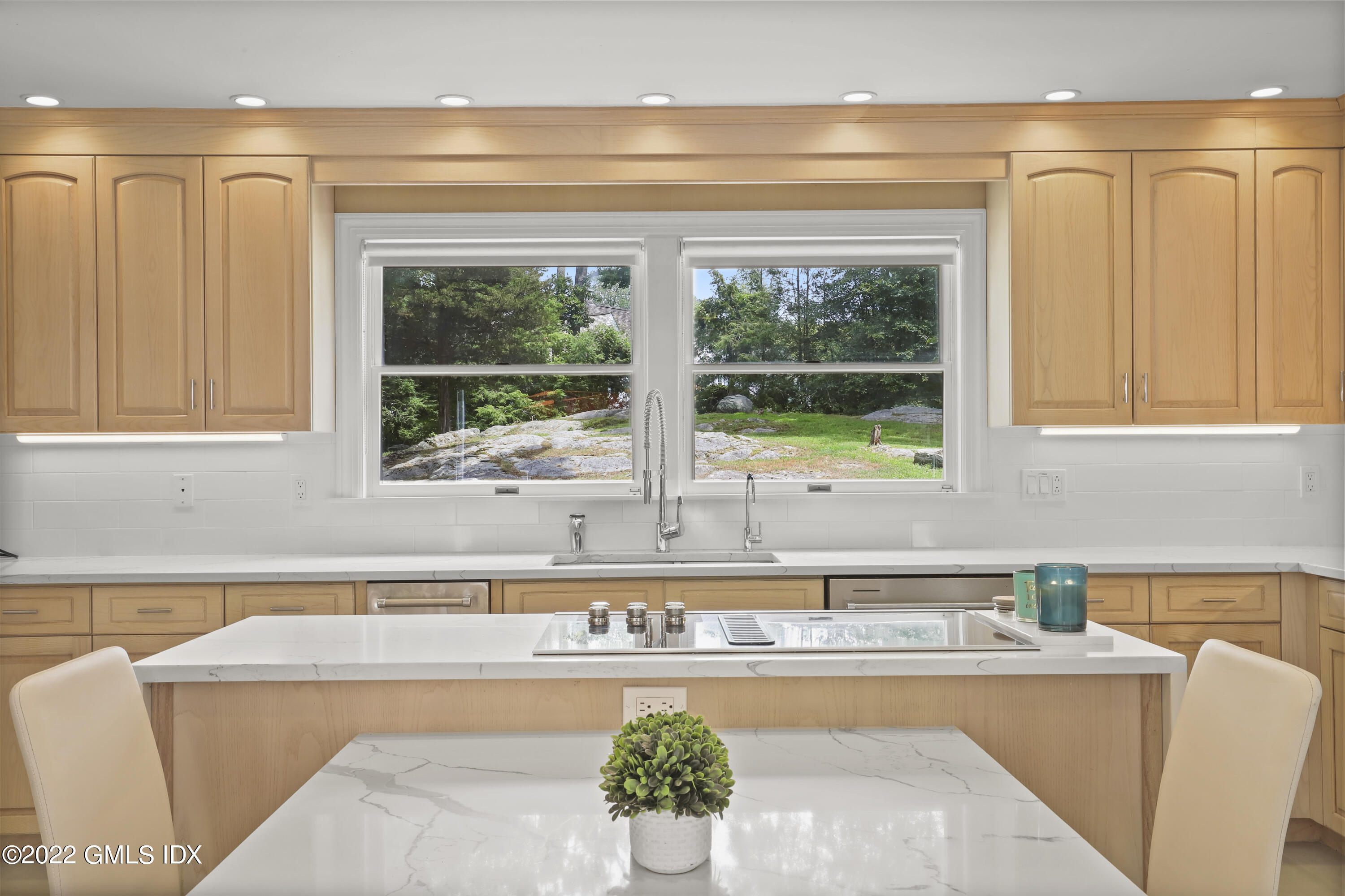 4 Juniper Hill Road Greenwich, CT 06830 - Photo 15 of 54 a view of a kitchen with a sink and large window