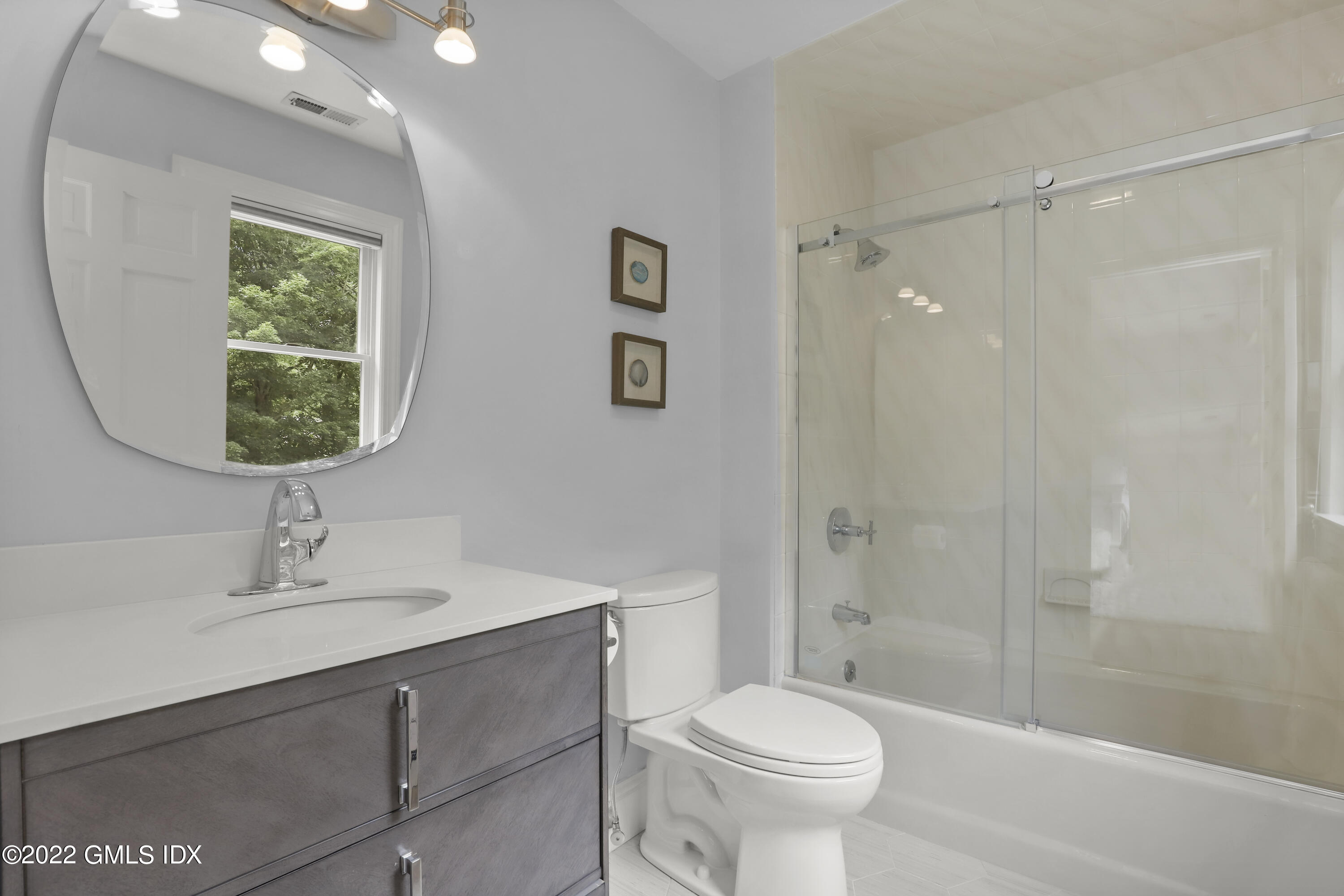 4 Juniper Hill Road Greenwich, CT 06830 - Photo 29 of 54 a bathroom with a sink toilet and shower