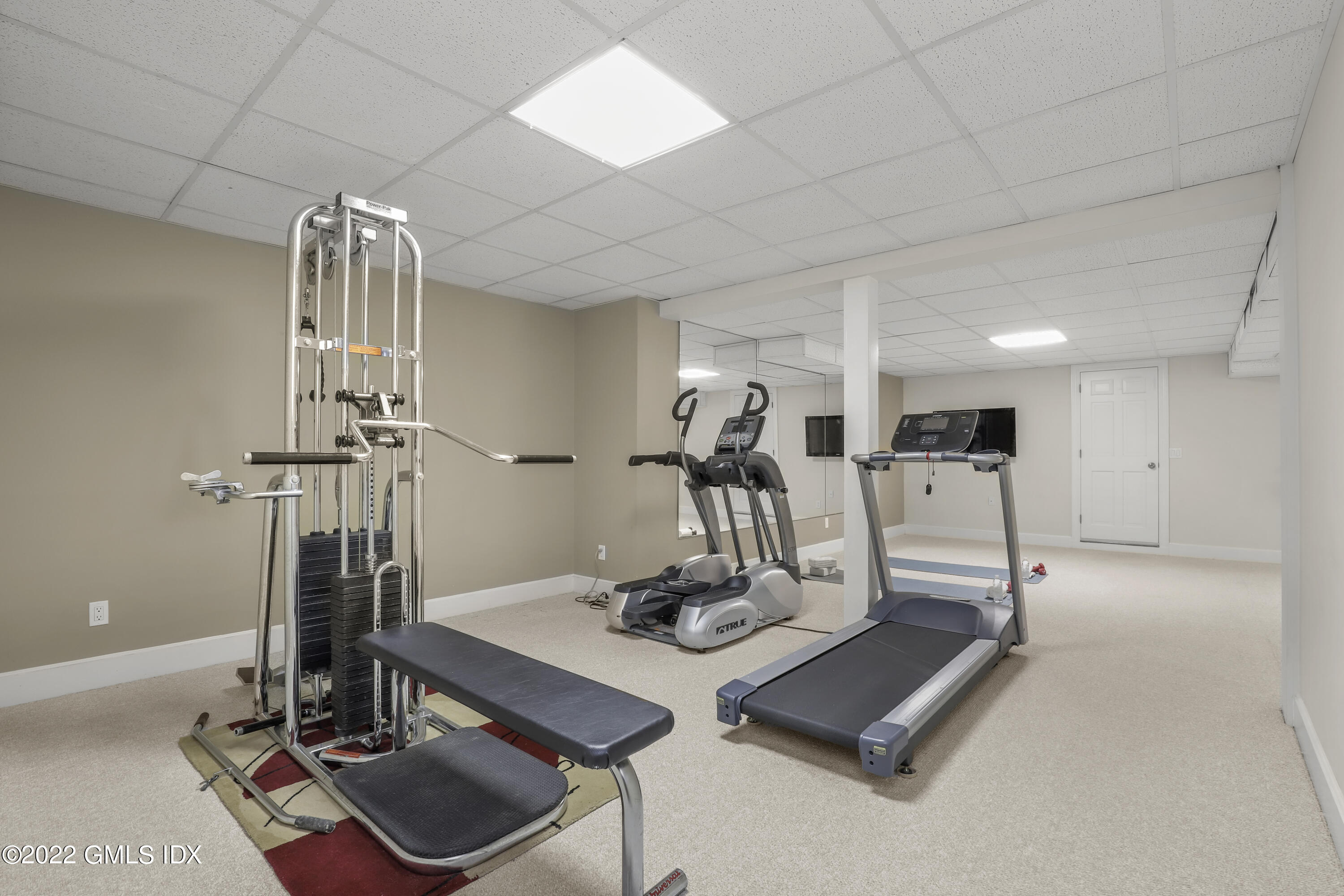 4 Juniper Hill Road Greenwich, CT 06830 - Photo 39 of 54 a view of a room with gym equipment