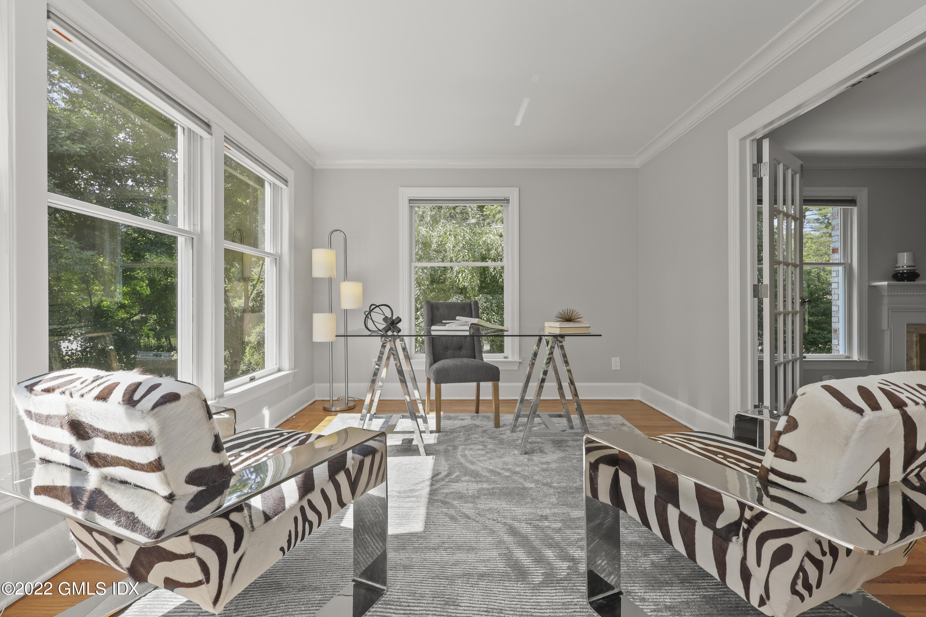 4 Juniper Hill Road Greenwich, CT 06830 - Photo 8 of 54 a living room with furniture and a large window