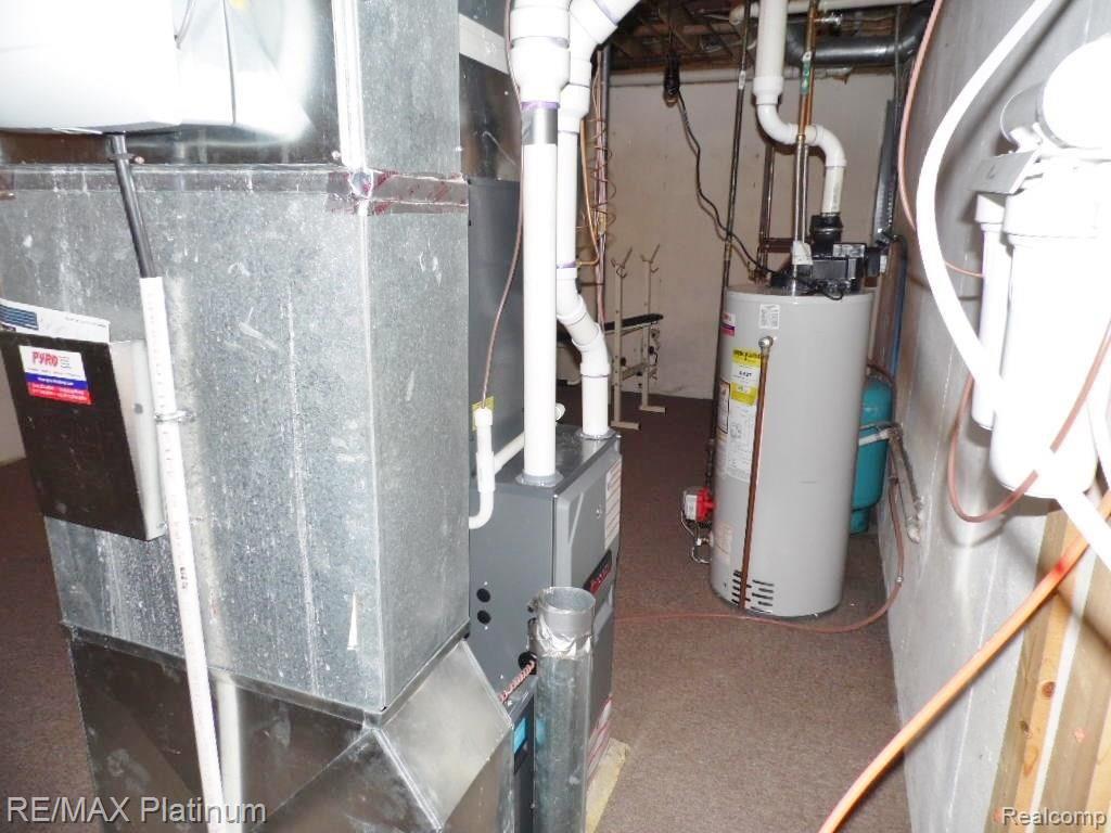 10070 Byron Road Howell, MI 48855 - Photo 17 of 20 Newer Furnace and Hot Water Heater