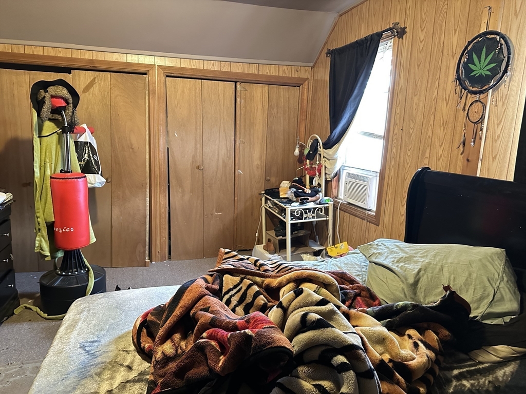 11 Foster Street Fall River, MA 02721 - Photo 15 of 15 a bedroom with a bed and a closet