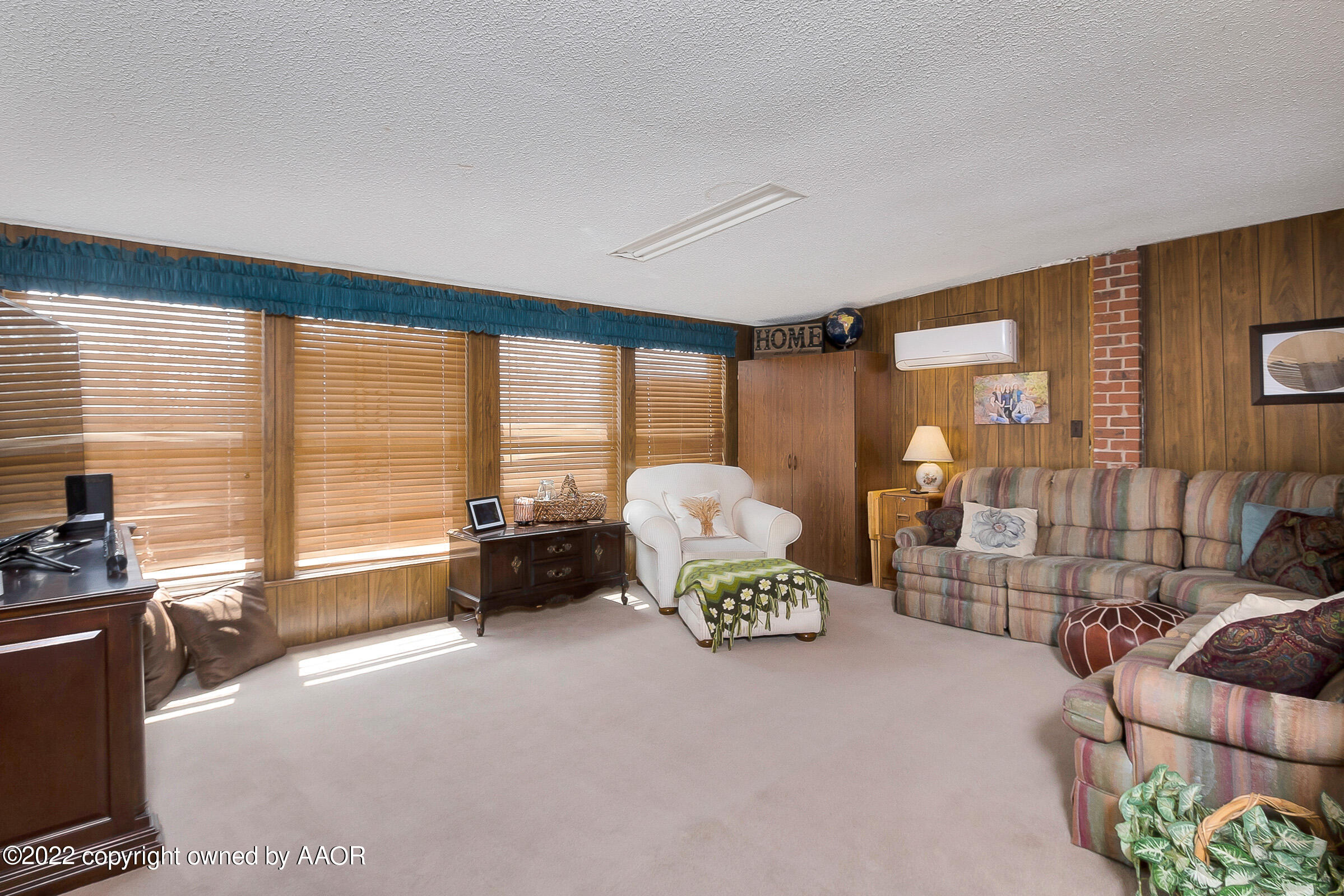 3310 Conner Drive Canyon, TX 79015 - Photo 11 of 24 a living room with furniture and a floor to ceiling window