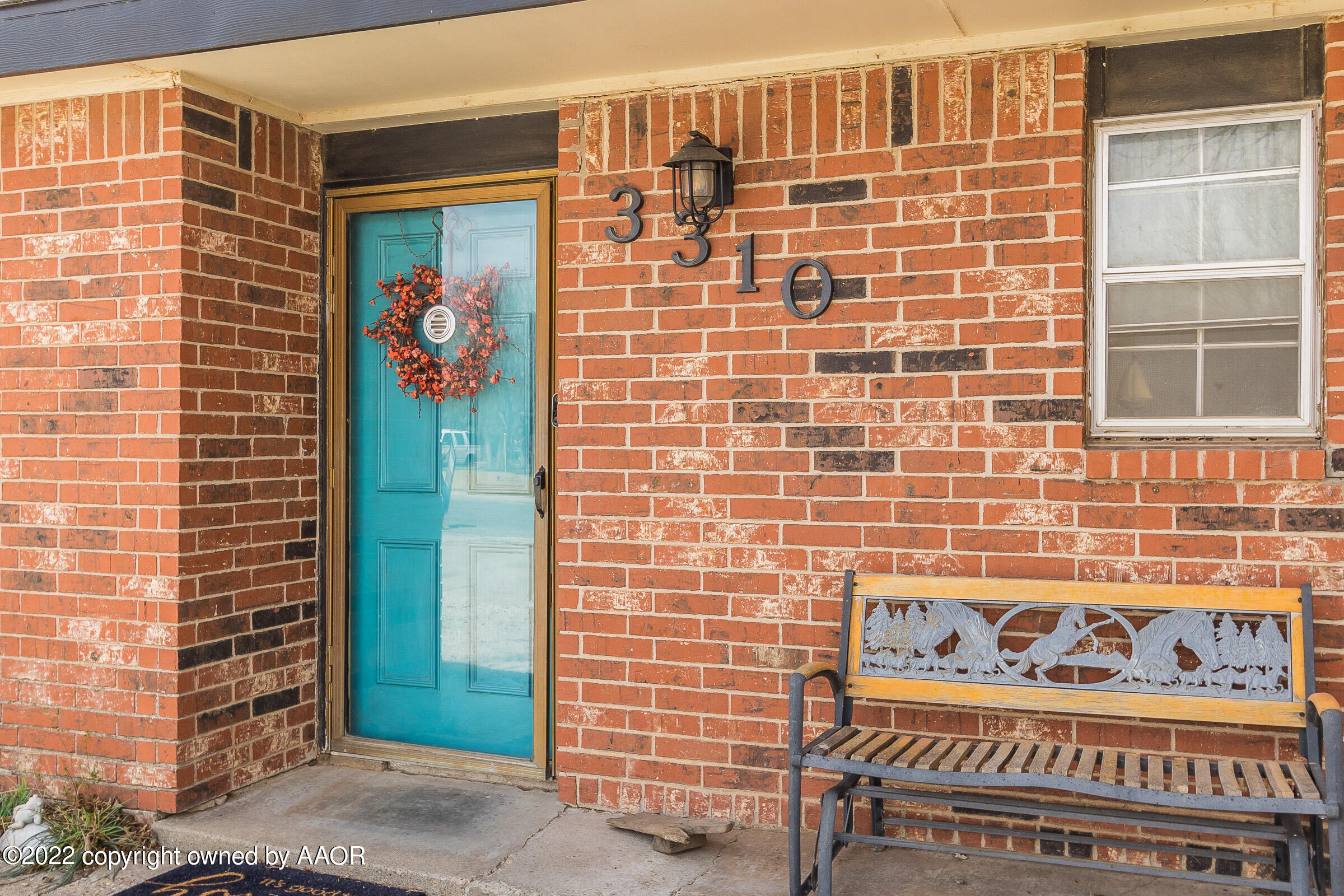 3310 Conner Drive Canyon, TX 79015 - Photo 2 of 24 a door view with a brick wall