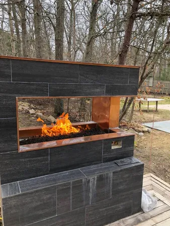 a view of backyard with wooden floor and outdoor seating