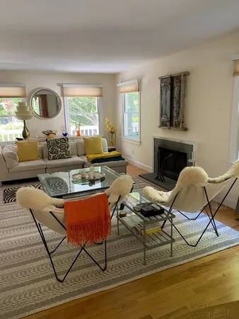 a living room with furniture or couch and a window