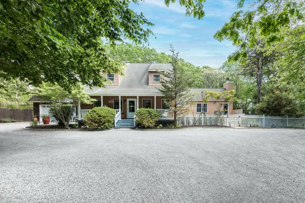 front view of a house with a patio