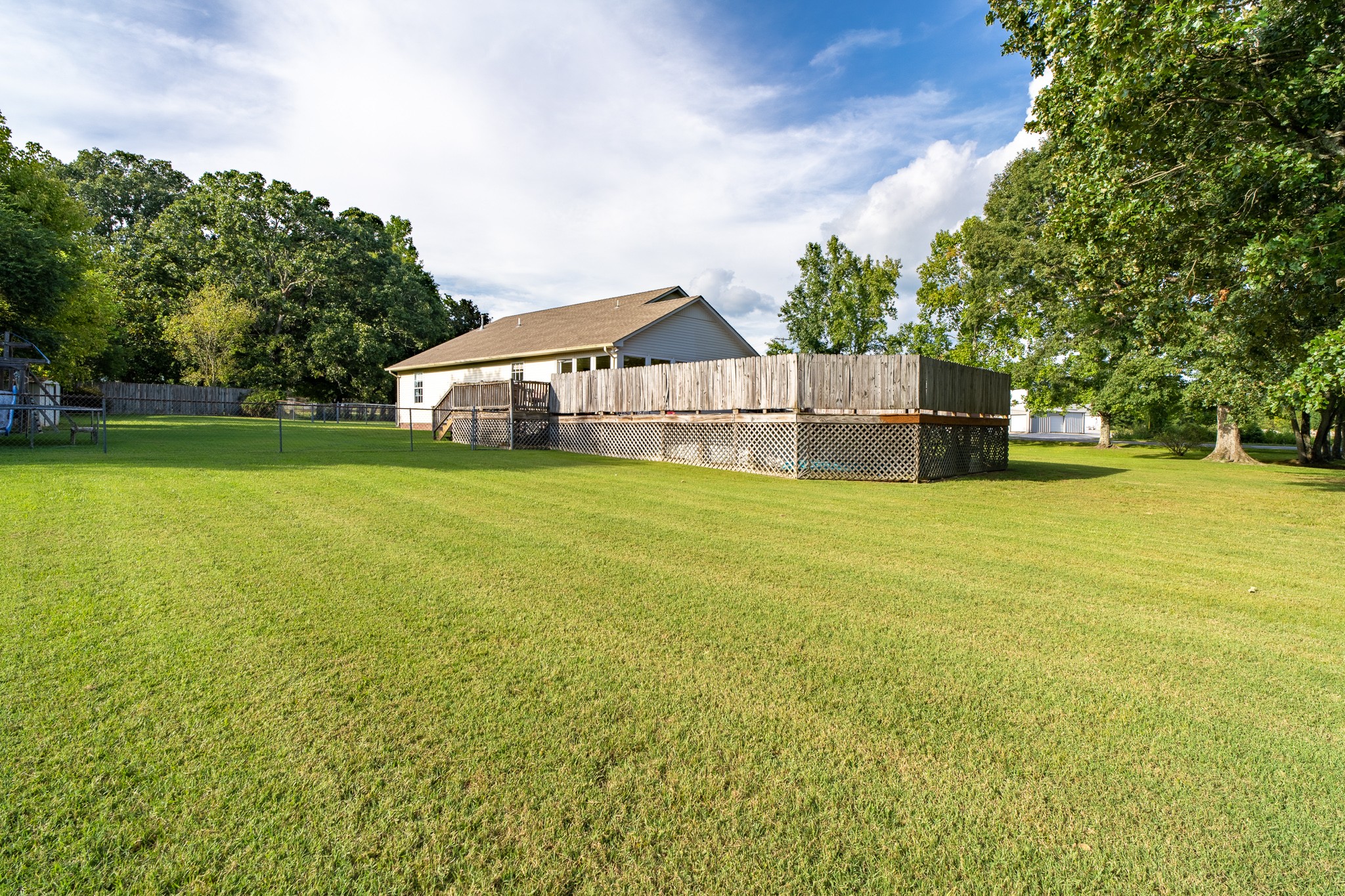 853 Prosser Road Leoma, TN 38468 - Photo 11 of 29 a house with swimming pool in front of it